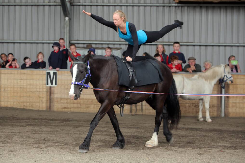 Helene Hoppe from Kirkstall on Prince demonstrates the skill of equestrian vaulting before an enthusiastic audience this week.  