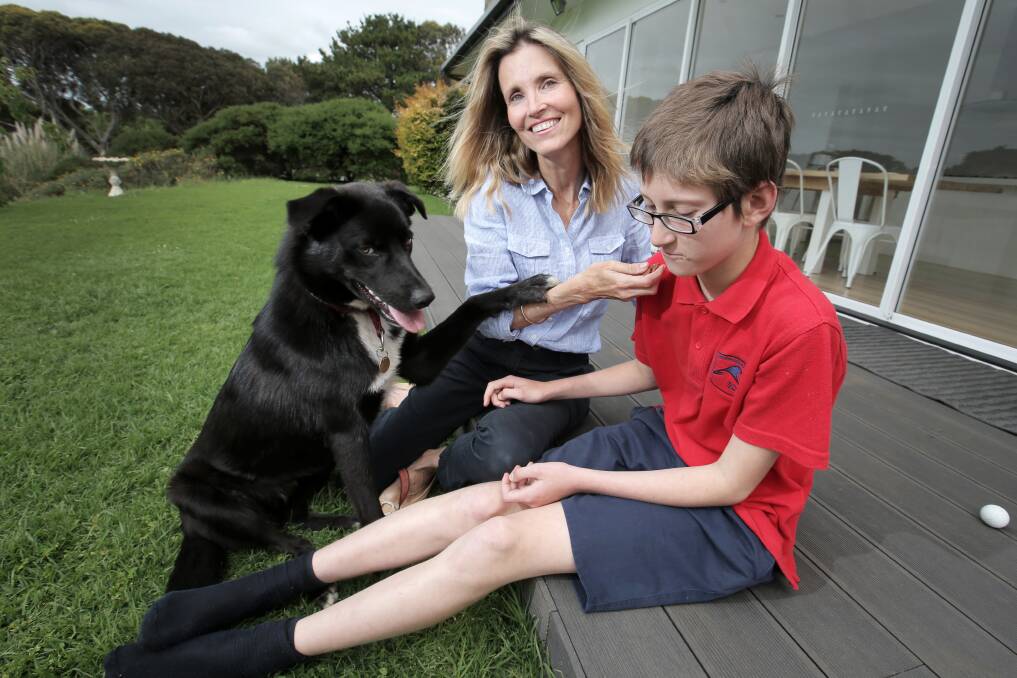Warrnambool’s Kena Currie, with her son Zander, 12, is hoping to establish a “dog share” with her sociable pet Four Paws. 