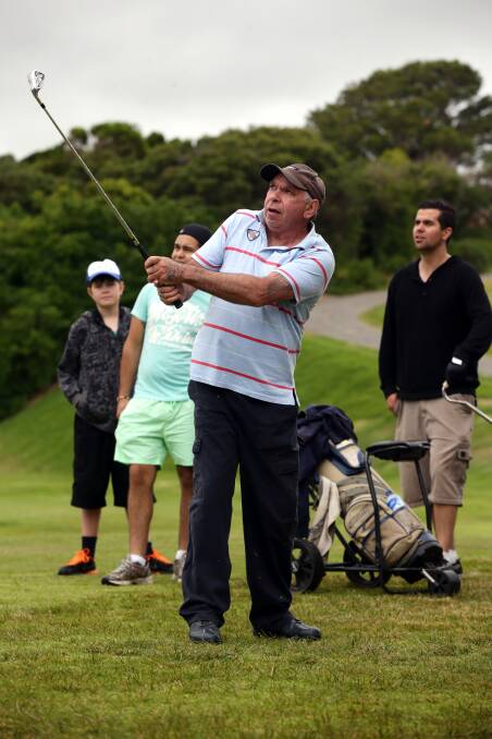 Andy Alberts chips on to 8th green during the Gunditjmara and Community Golf Classic fund-raiser.
