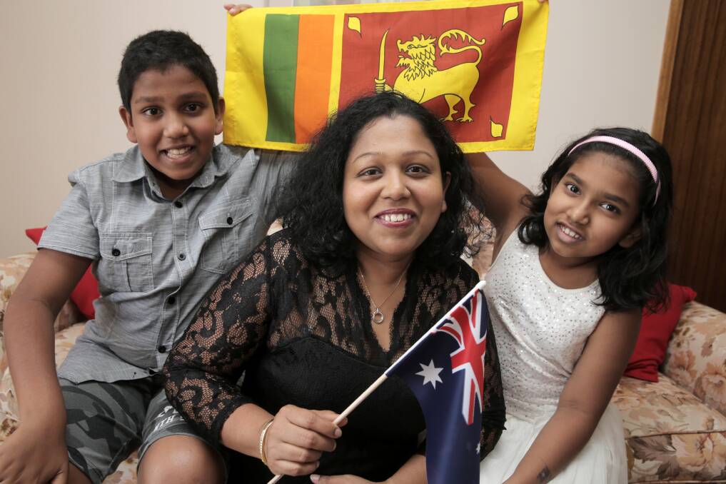 After a lot of travel, study, hard work and career changes, Sri Lankan migrant Dilani Mendis, with her children Dasindu, 11 (left) and Sanduni, 10, is proud to be known as an Aussie. 