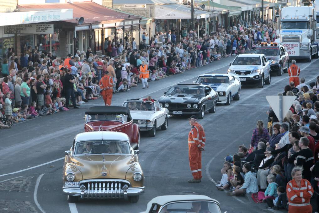 A convoy of cool cars cruise Sackville Street in Port Fairy during last night's Moyneyana Festival parade.
