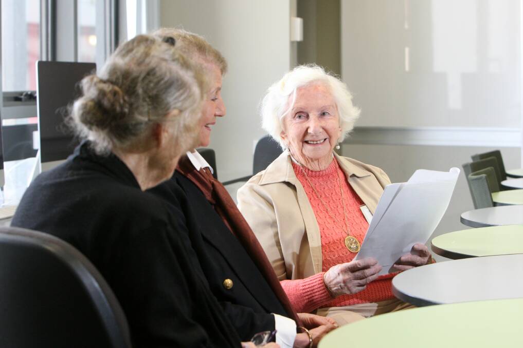 Teacher Lorraine Sharrock (right), who turns 90 in August, imparts some words of wisdom to Phillipa Caulfield at Warrnambool’s University of The Third Age.