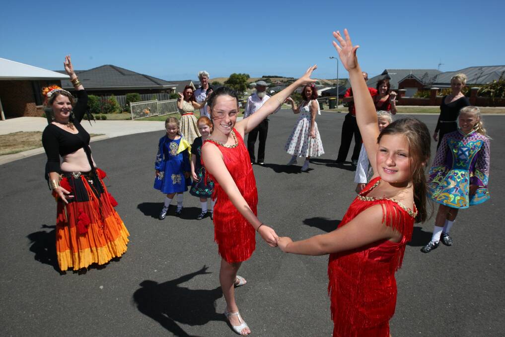 Ella Grundy (left) and Maddison Buchtmann take the lead among some of the dancers who are uniting in Warrnambool to raise money  for a worthy cause.