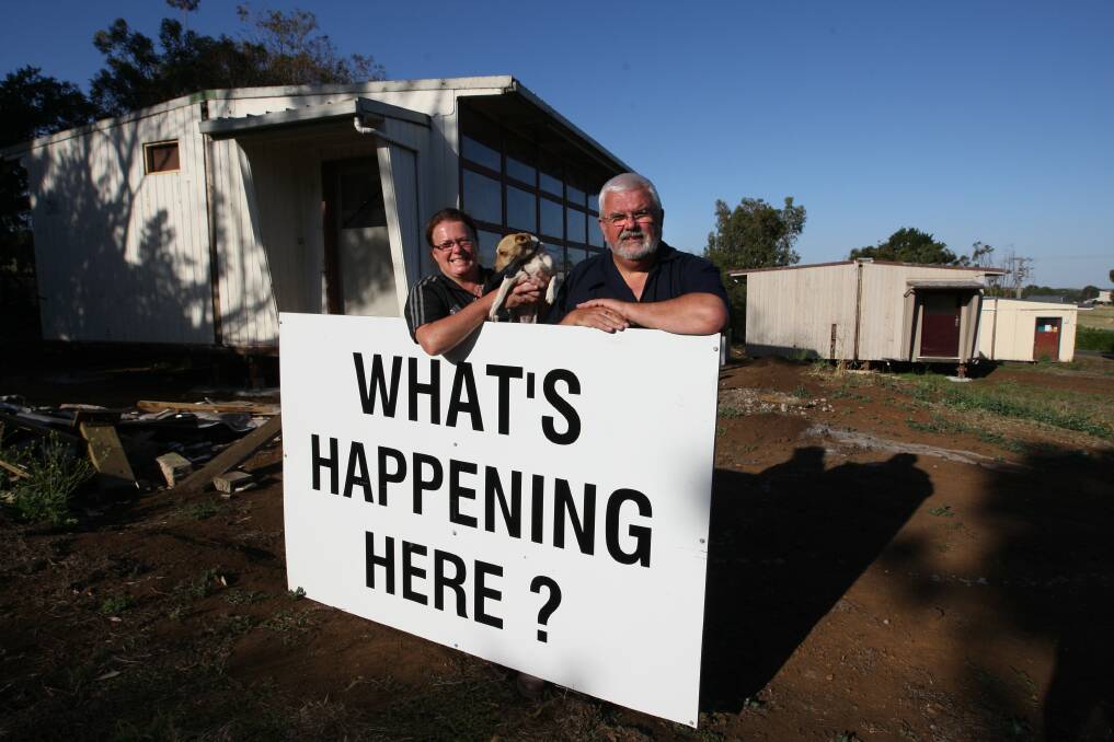 Amanda and Mick Fennessy, who are renovating portable classrooms into accommodation on their Tower Hill property, have had their stolen sign returned.