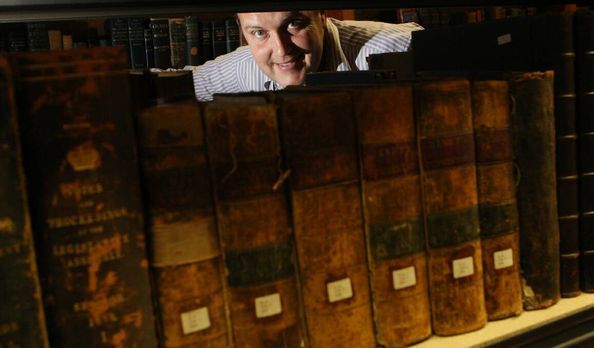 Warrnambool City Council’s tourism services manager Peter Abbott in Flagstaff Hill’s archival storeroom, which will be opened as part of the twilight tours. 