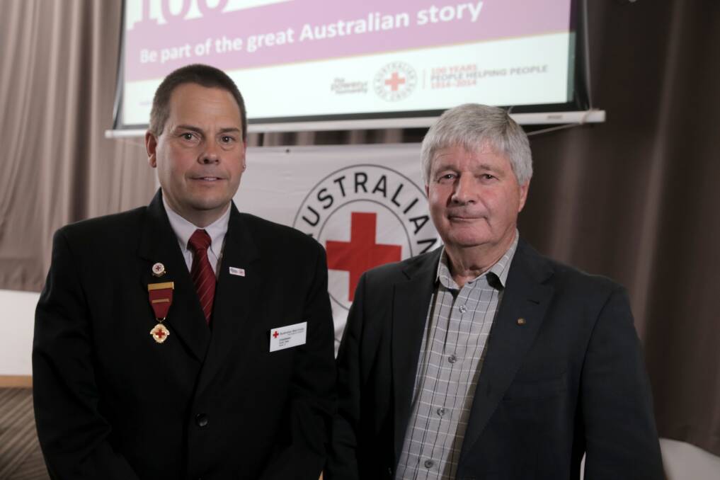 Red Cross chairman of zone 5 Andrew Squires (left) and ambassador Bob Handby at the Red Cross conference held in Warrnambool this week. 140807RG11 Picture: ROB GUNSTONE