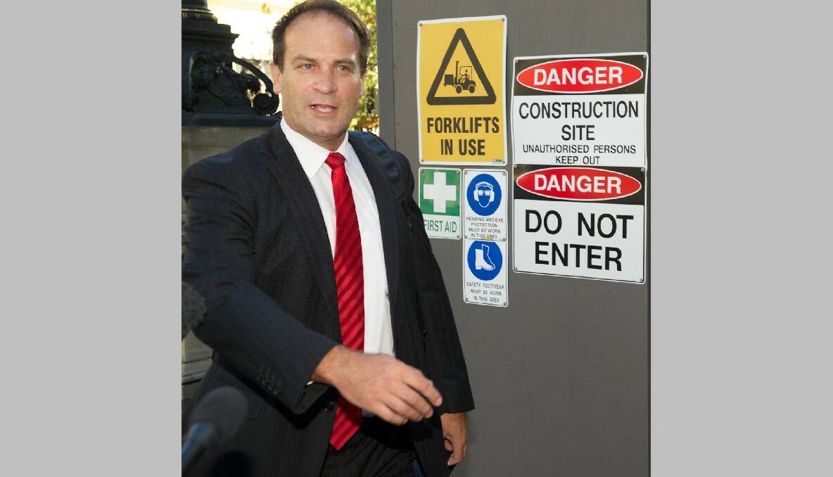 Frankston MP Geoff Shaw arrives at parliament on Thursday after Ted Baillieu stepped down as leader of the Victorian Liberal party. Photo by Jason South