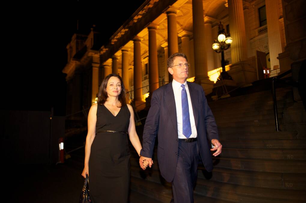 Ted Baillieu and his wife leave Parliament house after his shock resignation on Wednesday evening. Photo: Wayne Taylor