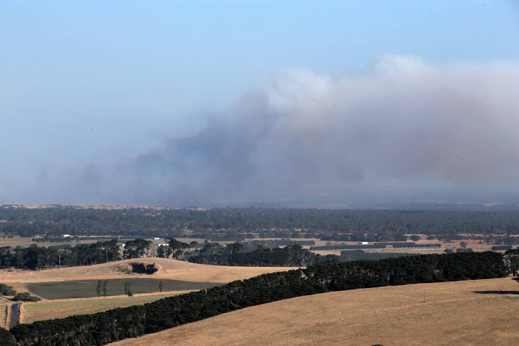 Smoke rises from the Stonyford fire yesterday. 