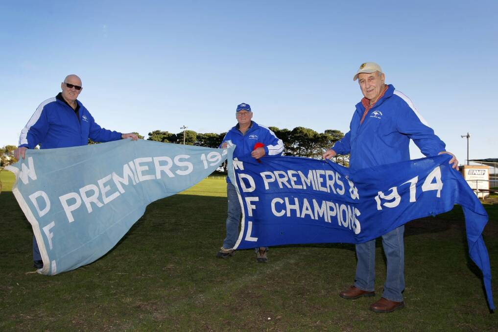 Russell's Creek 1963 premiership players George Capuano and Roy Brittain, with the 1974 club secretary Barry Doolan, are looking forward to celebrating the two premership years.