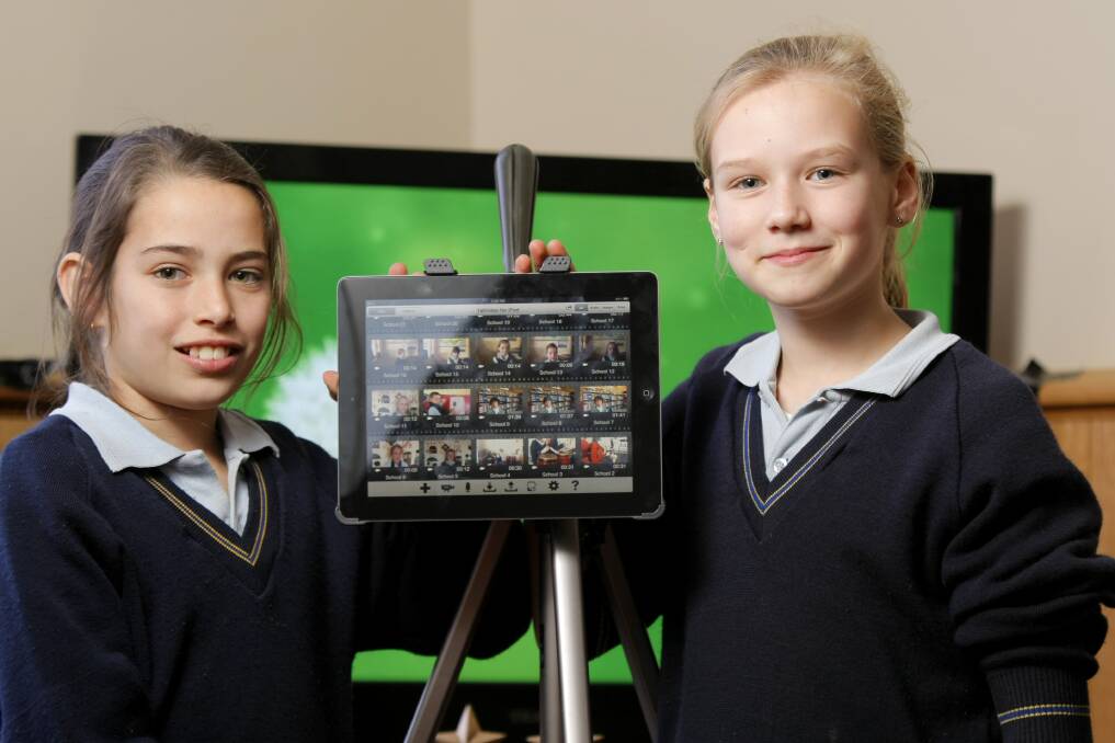  St Colman's Primary School student Keely Spoore, 10, and Isla Rous, 10, at the launch of the St Colman's Students Mini Film show. Picture: ROB GUNSTONE