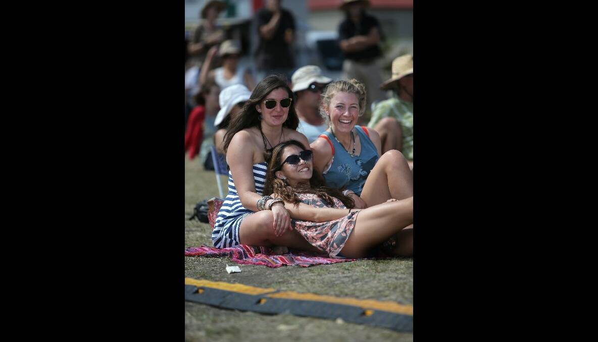Port Fairy Folk Festival Saturday: Pictured from left, Sonia Kaur, Indra Mari and Meg Finch from Hamilton enjoy the music at the Railway Place stage.