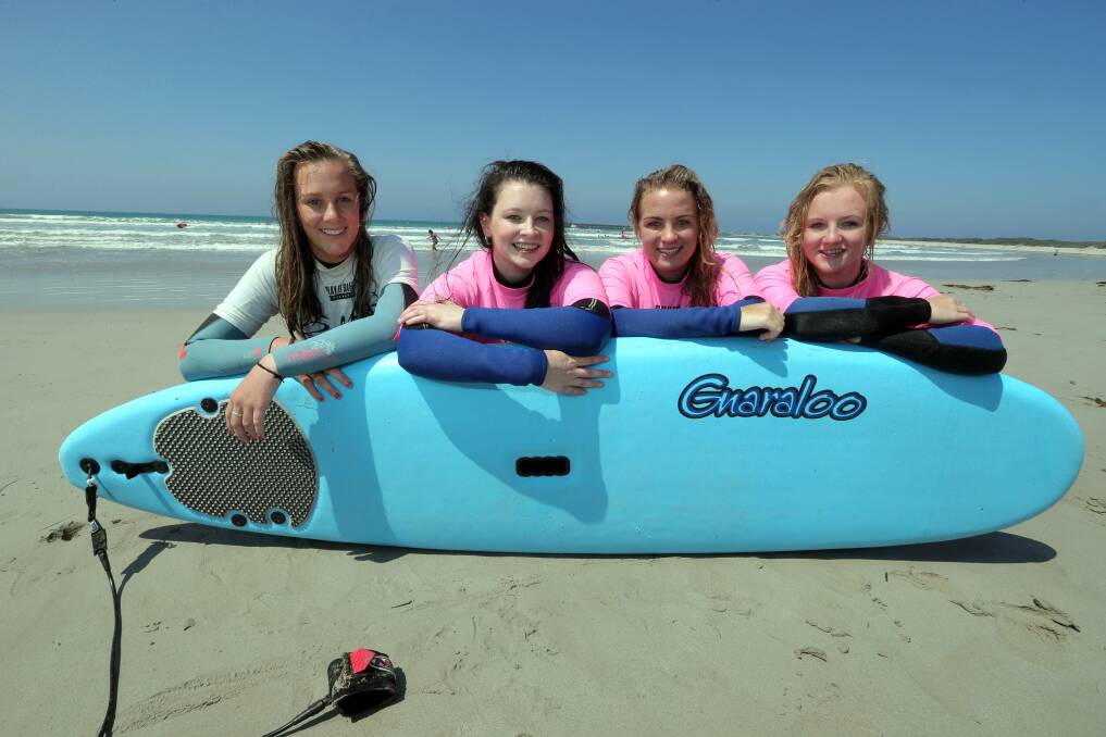  surf instructor India Payne with Warrnambool college student Erin Reardon 16, Garce Paulin, 16, and Amber Sharp, 16.