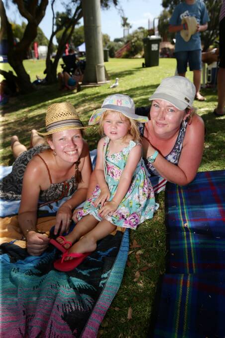 Narelle Hill from Warrnambool, Paige, 2, and Emma Spencer, from Portland, at Lake Pertobe.
