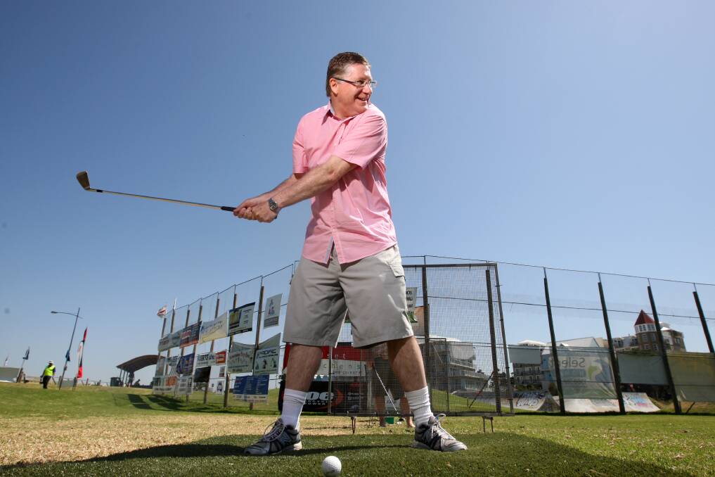 Dr Napthine takes a swing...
