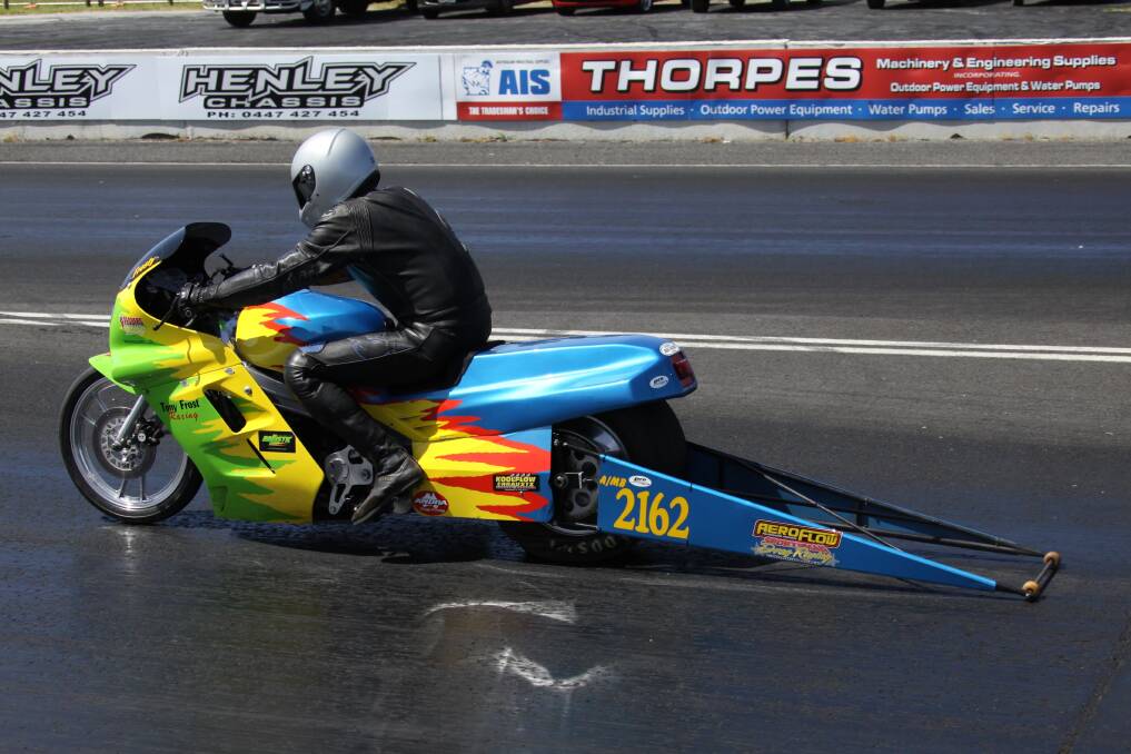 Warrnambool dragster Tony Frost powers up his Kawasaki ZX10 bike at South Coast Raceway, Portland on the weekend.