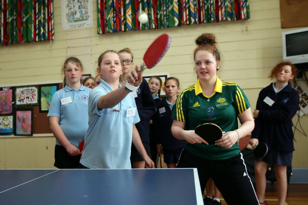 Table tennis Olympian Sarah Lazzaro with Warrnambool East Primary pupil Millie Quarrell, 12.