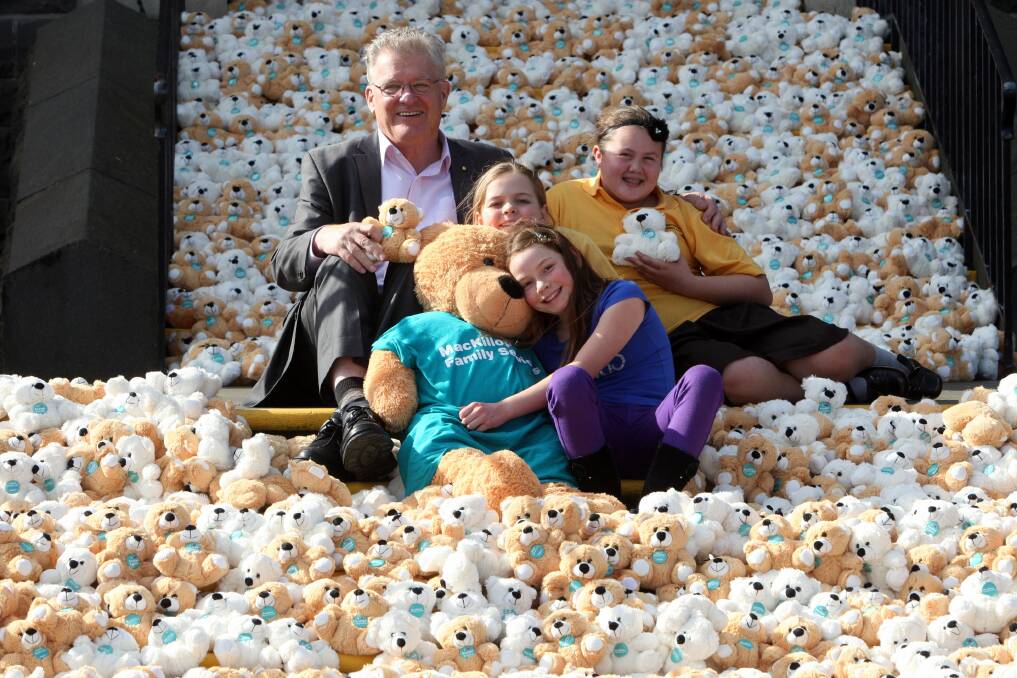 MacKillop Family Services displayed 2095 teddies in Warrnambool to represent the number of children and young people currently in foster care in Victoria. Principal Commissioner for Children & Young People Bernie Geary is pictured with excited passers-by Kiah Bentley, 7, from Warrnambool , Ruby Kelly, 10, from Warrnambool and Ashalee Smiley-Jones, 11.