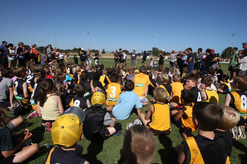 Kids football super clinic with Richmond players.