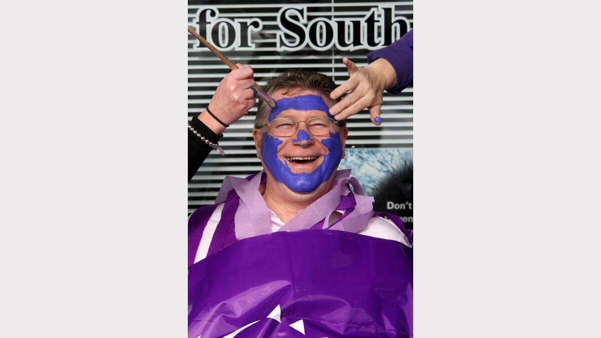 Denis Napthine helps promote Relay for Life with the Paint the Town Purple campaign last August.