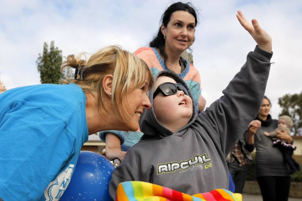 South west wish granting coordinator Gail Jaensch (left) helped make Camperdown 8-year-old Jayke Saligari's wish come true with his mum Belinda Saligari, as a police helicopter landed on the St Patrick's school oval this week.