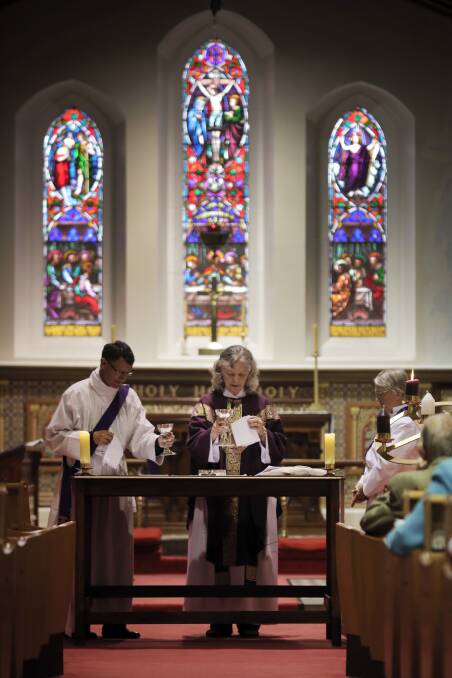 Newly ordained female priest Robyn Shackell conducts her first service at Warrnambool's Anglican Church.