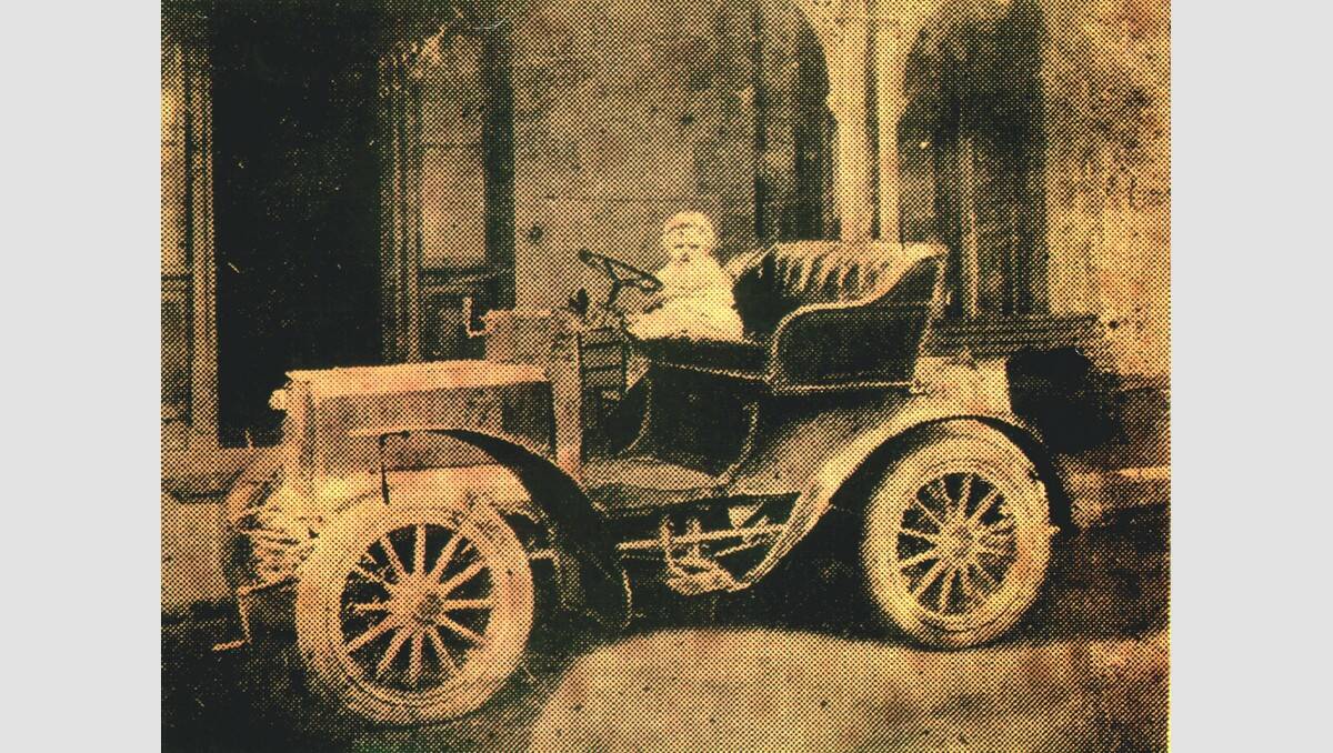 This grainy picture shows an unidentified baby at the wheel of Chas and William Downing’s 1906 De Dion Dorney. SOURCE: Warrnambool and District Historical Vehicle Club.