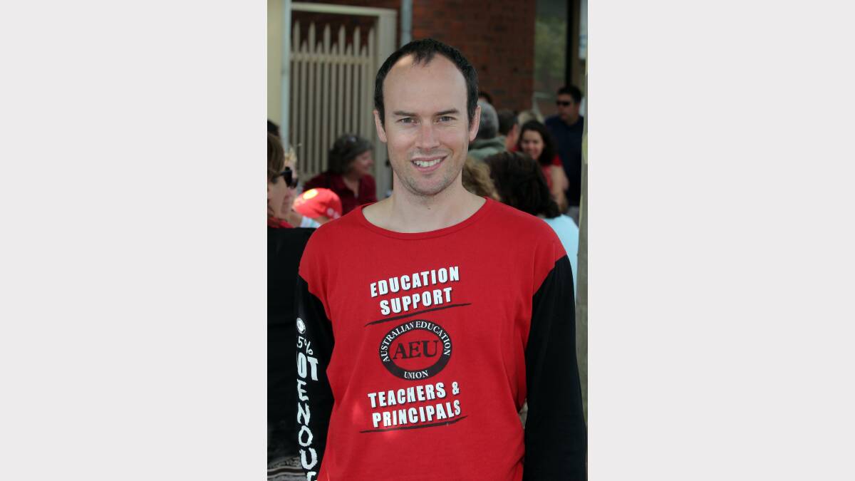 Teachers rally on Liebig Street yesterday outside MP Denis Napthine's office.