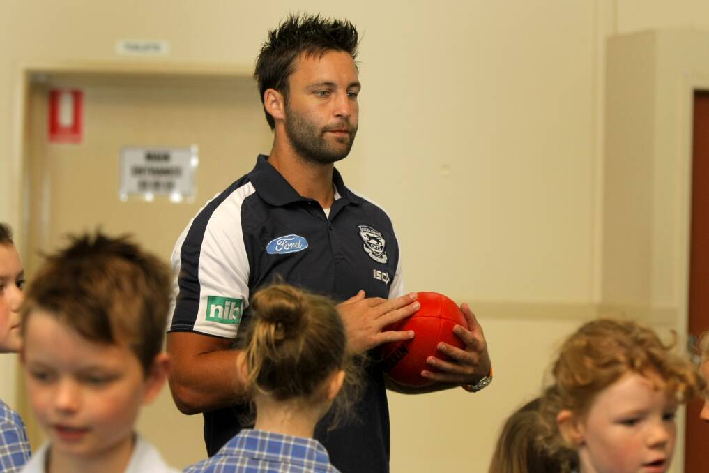 Jimmy Bartel talks with King's College grade three students.
