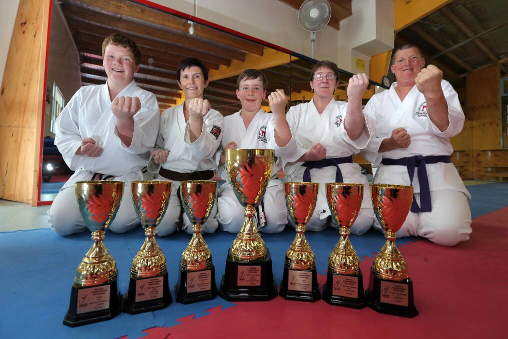 Funakoshi Karate International members (back from left) Matthew Conroy, Peter Moore; (front) Jill Cole, Garrin Williamson and Ellie Blackney have returned from a successful national all styles championships.