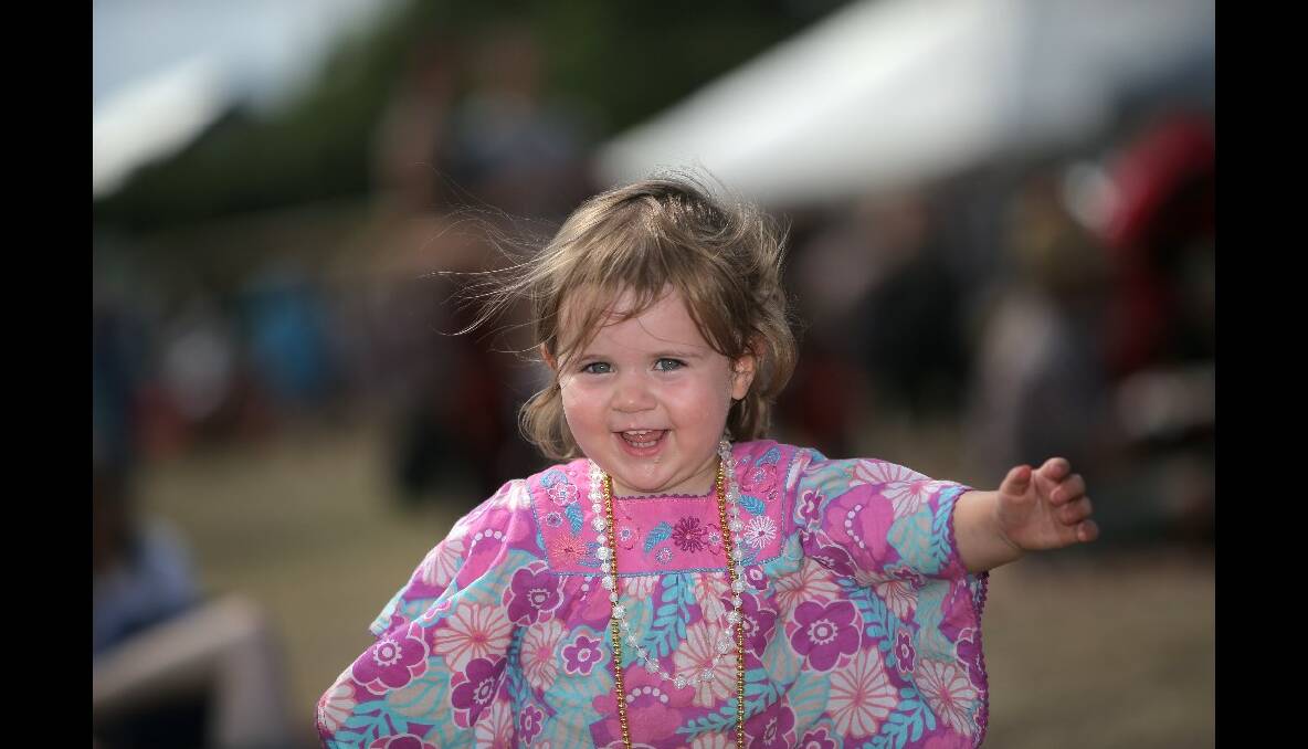 Port Fairy Folk Festival Saturday: One-year-old Bethany Moran from Warrnambool enjoy the music at the Railway Place stage  