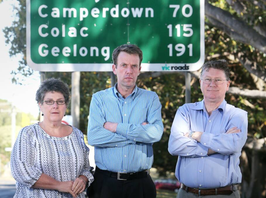 Vicki Jellie, member for Wannon Dan Tehan, and Denis Napthine were not impressed when Health Minister Tanya Plibersek snubbed Peter’s Project campaigners earlier this year. The sign behind them shows the distance from south-west town's to the closest cancer centre.