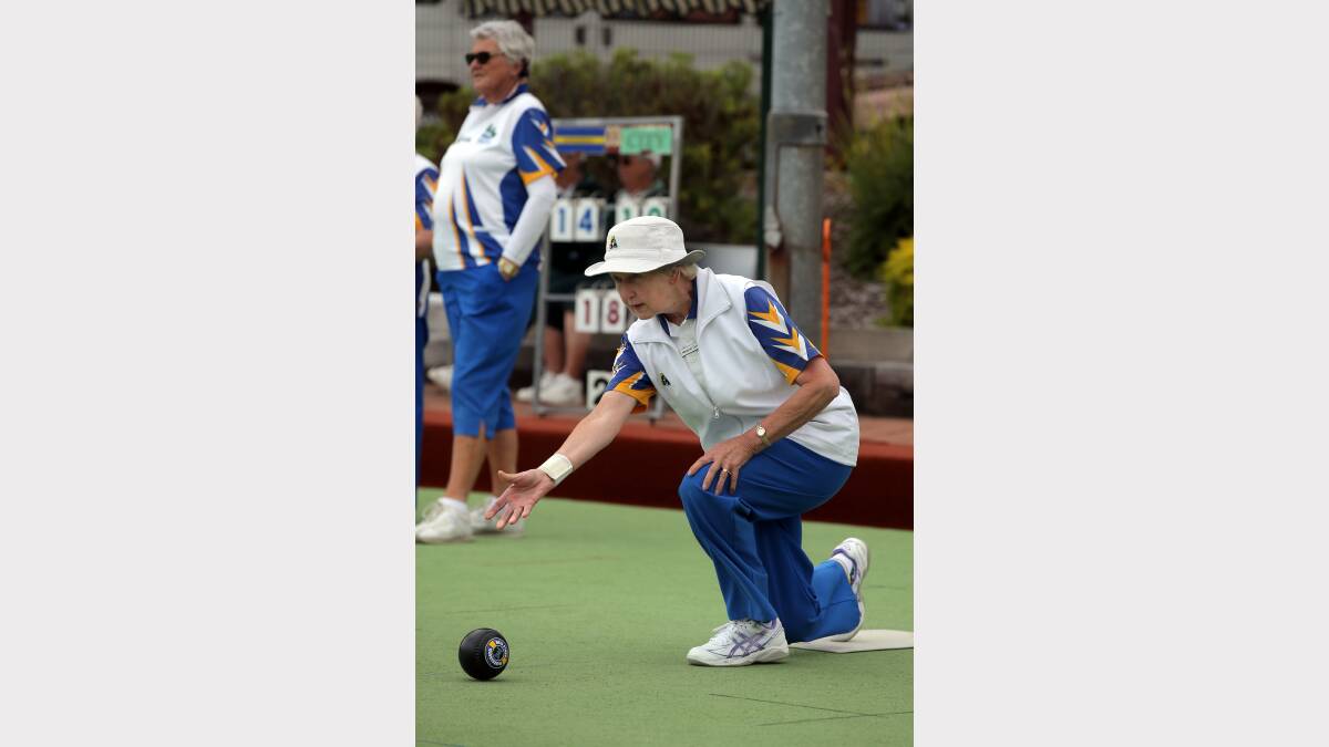 Warrnambool Blue's Margaret Quinn bowls during her side's match yesterday.