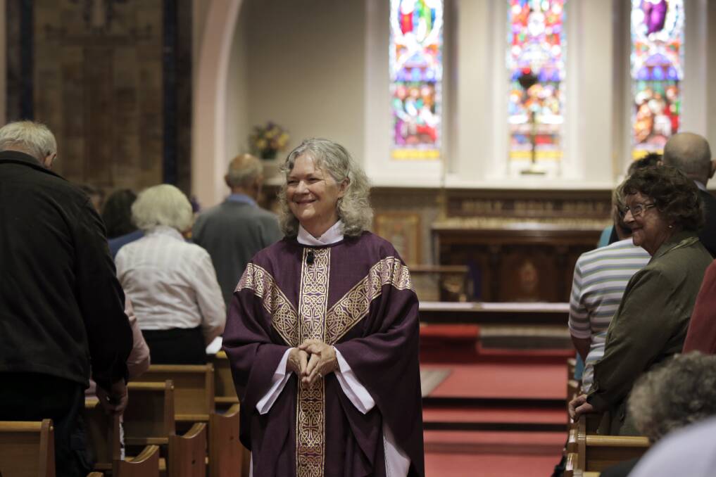 Newly ordained female priest Robyn Shackell conducts her first service at Warrnambool's Anglican Church.