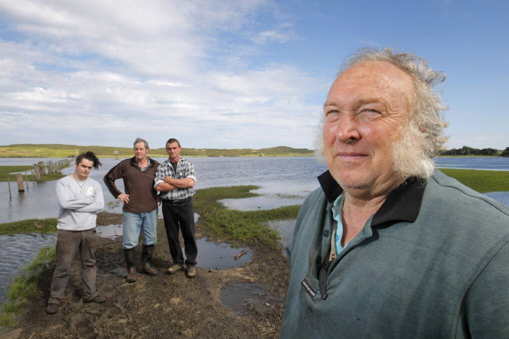 Yambuck farmers Morgan O'Brien, Mick McNamara, Mike Van Der Aa, and Damian O'Brien are unhappy with the management of the water system that is flooding their properties. Picture: ROB GUNSTONE