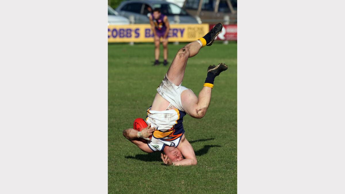 North Warrnambool's David Haynes takes a tumble on his way to a career high 12 goals vs Port Fairy.