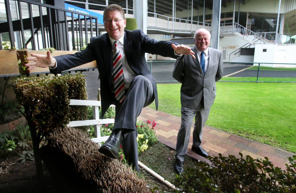 Denis Napthine has a go at jumping a steeple at the Warrnambool Racecourse mounting yards.