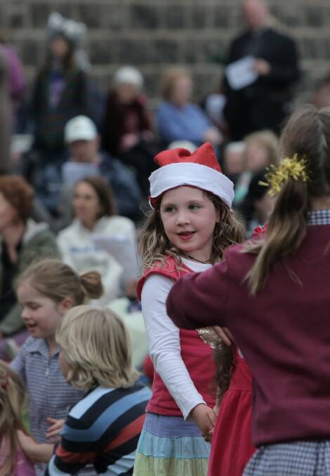 Caitlin Barry, 6, at the Port Fairy Carols on the Green.