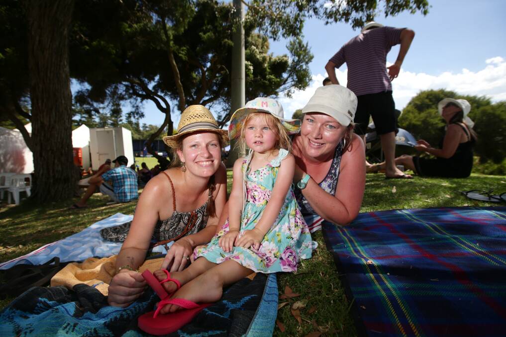Narelle Hill from Warrnambool, Paige, 2, and Emma Spencer, from Portland, at Lake Pertobe. 
