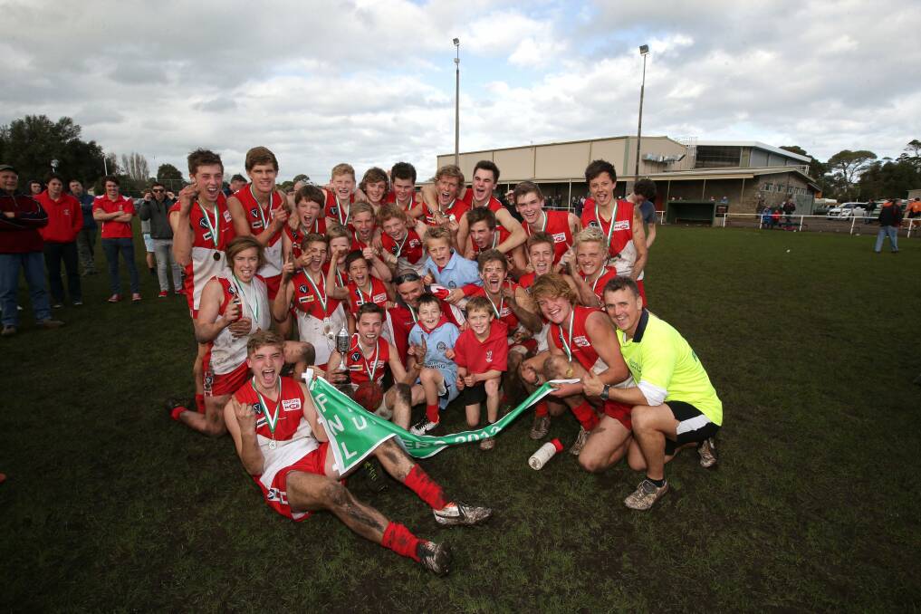 South Warrnambool players celebrate their Under 16 premiership win.