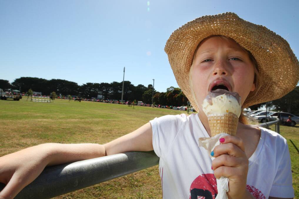 Sophie Paton, 7, from Macarthur eating icecream on a hot weather day. 
