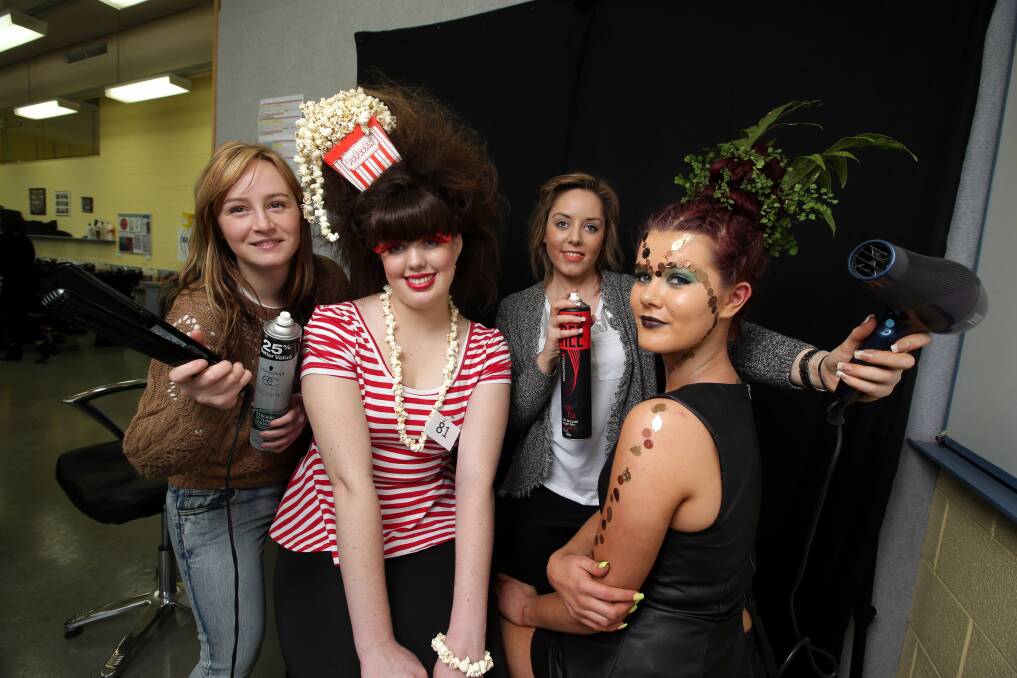 Nicole Dellar, certificate 4 Hairdressing student from Bendigo, with her friend Kate Biggs and Hayley Derzsi, from Warrnambool, and her model Miranda Scott. Picture DAMIAN WHITE