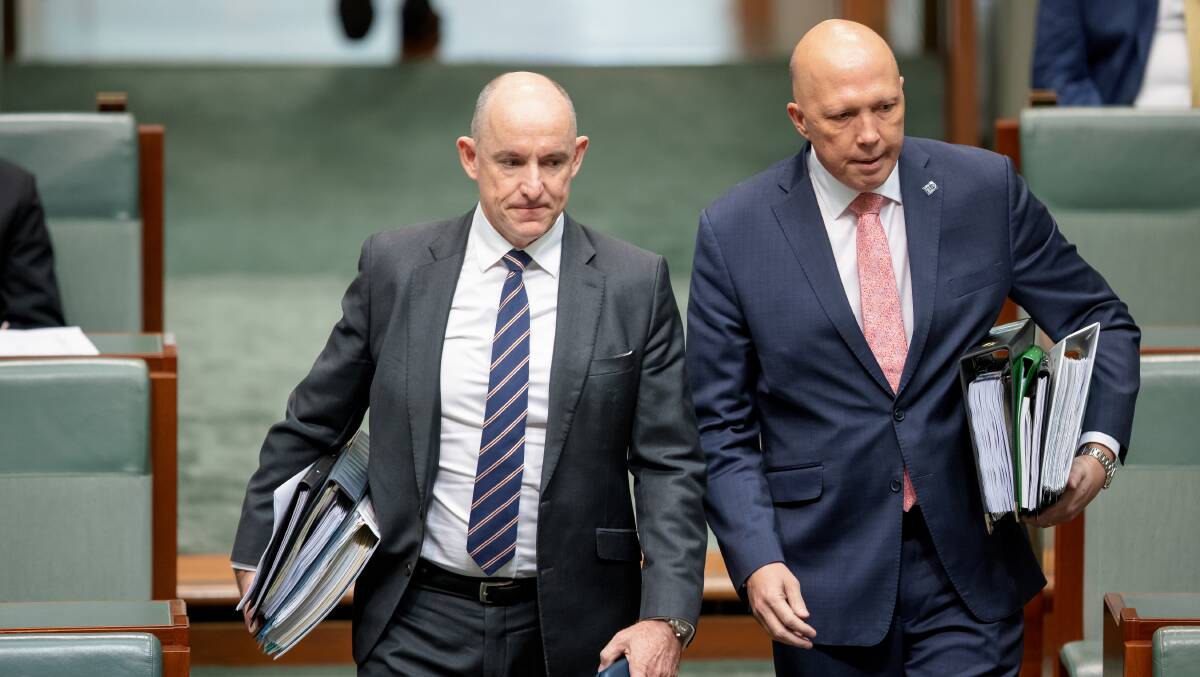 Former Coalition minister Stuart Robert arriving at Question Time with Peter Dutton. Picture by Sitthixay Ditthavong