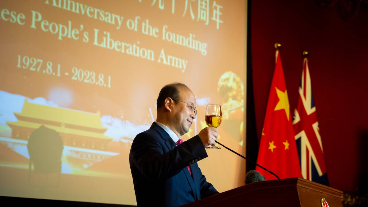 Chinese ambassador Xiao Qian toasts to "lasting peace and security in the region and the world" at the embassy on Thursday. Picture by Elesa Kurtz