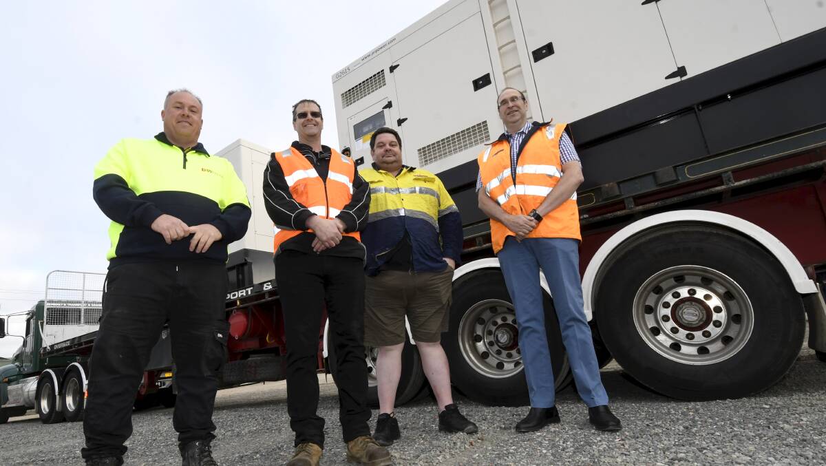 LAUNCH: DW Controls general manager Jeremy White, PR Power state manager Mike Corbett, CJ Milne project manager Che Rogers and ELA manager power, communications and IT Marco Pavincich at the generator delivery on Wednesday. Picture: Lachlan Bence.