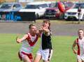 South Warrnambool's Shannon Beks battles for the ball with Koroit's Jake McCosh. Picture by Eddie Guerrero