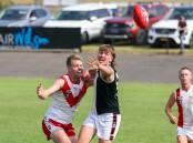 South Warrnambool's Shannon Beks battles for the ball with Koroit's Jake McCosh. Picture by Eddie Guerrero