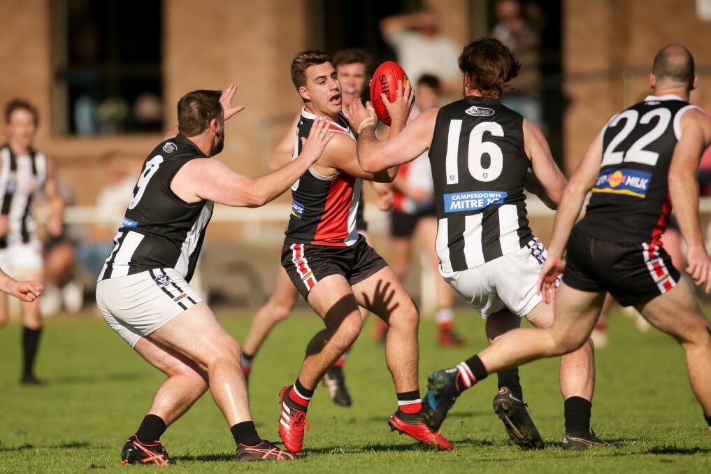 Koroit's Frazer Robb breaks free and looks for a teammate to handball to. Picture by Chris Doheny