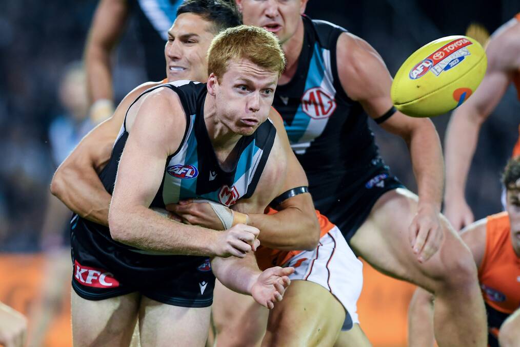 Willem Drew gets a handball away during Port Adelaide's 2023 semi-final against GWS. Picture by Getty Images