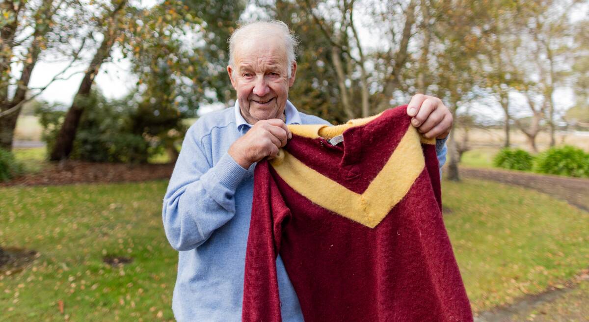 Robbie Wallace with the Nirranda jumper he won a premiership with in 1964. Picture by Anthony Brady